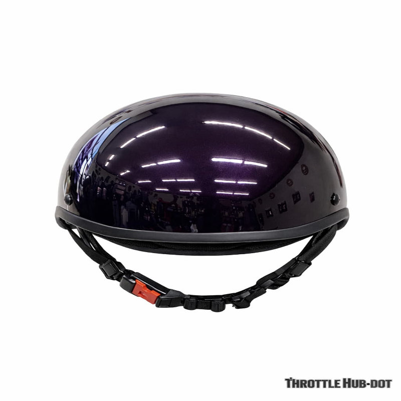 Black motorcycle helmet with a reflective visor on a white background