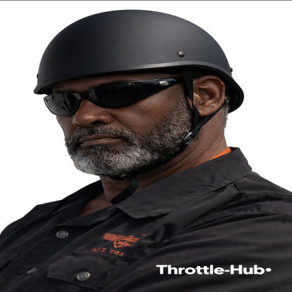 Man wearing a black helmet and sunglasses with 'Throttle-Hub' branding.