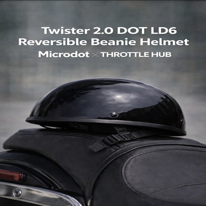 Person wearing a black helmet with text about Twister 2.0 DOT LD6 Reversible Beanie Helmet by Microdot and Throttle Hub.